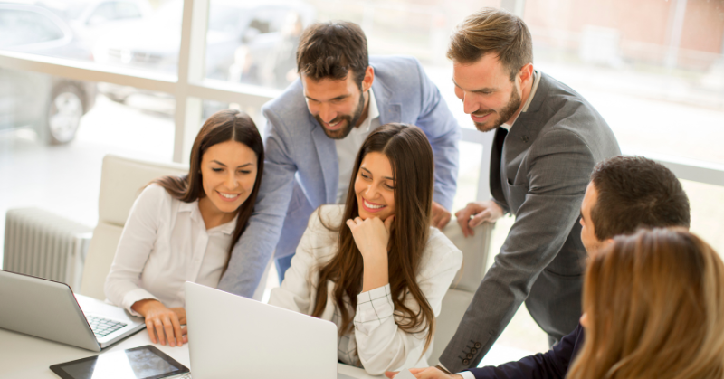 Group of young adults in business training